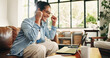 © OnPoint/peopleimages.com - Happy woman, winning and sofa with laptop in home for achievement, bonus or promotion. Excited, female person or user with smile on computer for victory, success or business accomplishment in house
