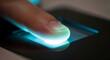 © ManuStockStudio - Finger pressing a glowing button on a dark electronic device screen