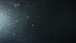 © GCapture - background of particles wave in air over black background and lens flare