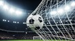 © homan - Soccer ball hitting the back of the net in a large floodlit stadium at night, capturing the moment of a winning goal during a professional match.