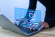 © WICHAI - A person works on a laptop with a dashboard for data analysis and database-connected metrics for operations in finance, sales, marketing, digital transformation, and business intelligence.
