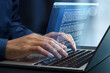 © tadamichi - Document writing software. Business text editing and word processing. Businessman typing on laptop computer keyboard.