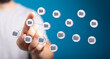 © vegefox.com - Hand interacting with digital network of connected folders representing data management and cloud storage, symbolizing