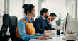 © P2000/peopleimages.com - Call center, computer and woman in office, headset an communication with advice. Employees, conversation and people with pc, coworking and contact us with online reading, internet or customer service