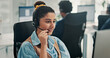 © P2000/peopleimages.com - Call center, happy or woman in office with headset, contact us or communication in customer service. Smile, coworking or consultant in agency with tech, advisory or telecom in client assistance.