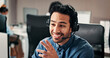 © P2000/peopleimages.com - Call center, happy or man in office with headset, contact us or communication in customer service. Smile, coworking or consultant in agency with tech, advisory or telecom in client assistance.