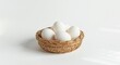 © The 2R Artificiality - Raw eggs resting in a basket on a bright white background