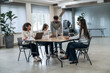 © standret - Company staff is sitting. Group of people are working in the office together as a team