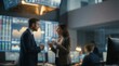 © Jhon - Blurred Cinematic Background of Business Professionals Discussing Financial Markets in a High-Tech Stock Exchange Trading Floor