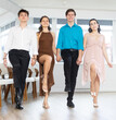 © JackF - Young girls and guy dancing folk dance in row in dance studio