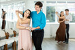 © JackF - Couple of young guy and young woman dancing waltz in studio