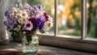 © Ghuman - Fresh bouquet of wildflowers in glass vase beside window, soft natural light and home freshness vibe.