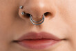 © New Africa - Woman with beautiful nose piercings, closeup view