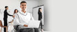 © Pixel-Shot - Man in wheelchair with laptop in office