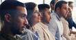 © Kobus Louw/peopleimages.com - Business people, meeting and listening with workshop in row for conference or training staff. Group, employee or colleagues in line with audience for work convention, seminar or team presentation