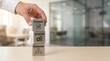 © Shabbir - A hand in a white shirt sleeve placing a block on top of two others labeled standard, operating, and procedure on a light wood desk in a modern office setting with blurred background.