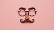 © Farah - A creative face made of fake facial hair and glasses on a pink background