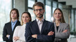 © ASDF - A group of people in suits are posing for a photo