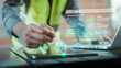 © HappyEva - Engineer hand using stylus on tablet with predictive maintenance dashboard UI hologram for industrial IoT concept, Zero downtime, OEE Overall Equipment Effectiveness, Sensor network, Efficiency Safety