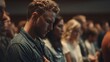 © M - Man praying in church congregation people crowd worship prayer religion