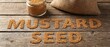 © DavoeAnimation - Mustard seed words spelled with grains on wooden surface