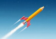 © DesignArt - A pencil shaped rocket soars through a clear blue sky with a trail of flames