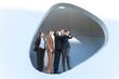 © VISTA by Westend61 - Business team looking to the future with binoculars outdoors in Barcelona