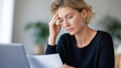 © Denis Yevtekhov - Startup jewelry woman with documents on laptop, small business ecommerce and finance report, stressed person with paperwork bills and debt review, faceless entrepreneur pressure, defocused