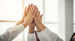 © KAMRAN - Corporate team doing a high five together perfect for successful project completion team unity and business collaboration