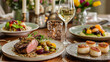 © MdRafi - Elegant multi-course meal served on a beautifully decorated dining table with fine china and glassware.