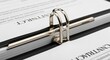 © Khaisan - Documents bound by silver clips on a contract and agreement papers viewed from above