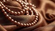 © Anatoll Paveel - Beautiful pearl necklace made of brown silk, close-up.