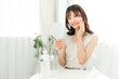 © buritora - Skin care, young Asian woman doing face care (cheeks, moisture, elasticity, moisturizing)