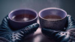 © ABF_MATEO - Two hands in gloves hold steaming cups of warm beverage, cozy winter mood