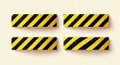 © Syukur - Four textured rectangular objects with diagonal yellow and black stripes, shadows cast