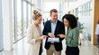 © EmmaStock - Business meeting collaboration modern office digital presentation bright interior professional perspective teamwork dynamics
