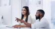 © peopleimages.com - Computer, pointing and talking with designer people in office for online planning or training. Collaboration, feedback and pc with happy design team in creative workplace for coaching or development