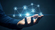 © Desti - Abstract network of people icons interconnected with glowing lines, floating above a person's open palm, symbolizing connection and community