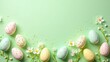 © rahwik - lively easter eggs with apple blossoms and sugar sprinkles on pastel green background top view with copy space spring festive flat lay concept of greeting cards, advertising, retail promotion