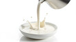 © Orislava - A close-up of fresh cream being poured into a white dish, creating a splash effect against a light background.