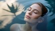 © Trendy Motion - Woman Floating Water Palm Shadow Spa