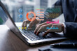 © Kittiphan - Businessman with a modern visual screen global network connection Graph analyzing financial growth and investment data planning concept