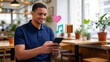 © StockVisionLab - Smiling young man using smartphone in cafe with social media icons,favorite content engagement and digital lifestyle connection concept