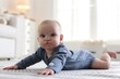 © New Africa - Cute little baby on floor at home