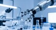 © FatimahNabilah - Robotic arm precisely holding small sphere in laboratory