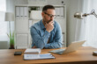 © Miljan Živković - Man thinking about work problem, planning business strategy