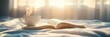 © Adisorn - Cozy morning scene with steaming coffee cup and open book on a bed, bathed in warm sunlight.