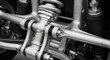 © Polina - Automotive suspension system detail, mechanical precision, in black and white background