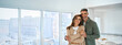 © insta_photos - Smiling affectionate loving middle aged couple, happy romantic mature older Latin man and woman in their 50s hugging looking at camera standing together in modern kitchen at home. Portrait.