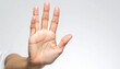 © Nashihal - Close-up of a human hand showing stop gesture, clean white studio background, high key lighting, sharp focus, detailed skin texture, advertising concept, copy space, commercial stock photography, 85mm